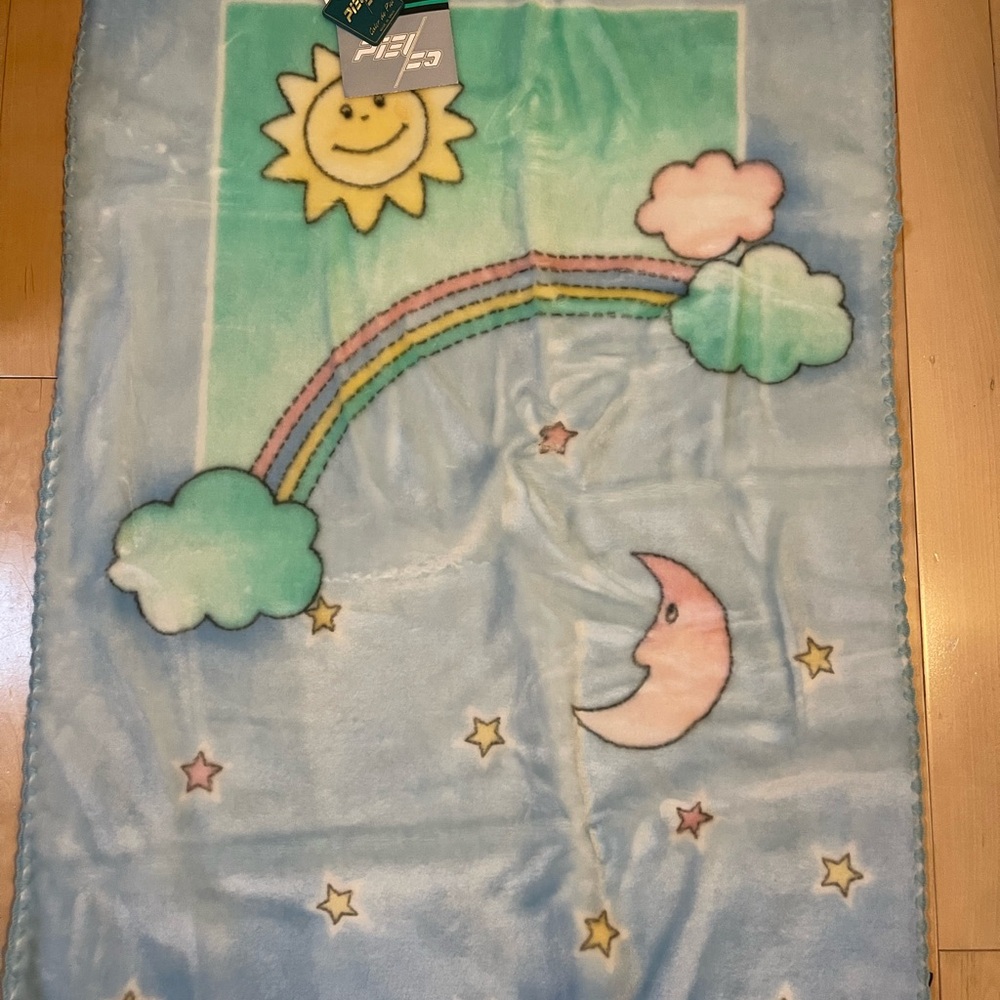 New in original packaging and tags. PiEl COURTELLE® Baby Blanket